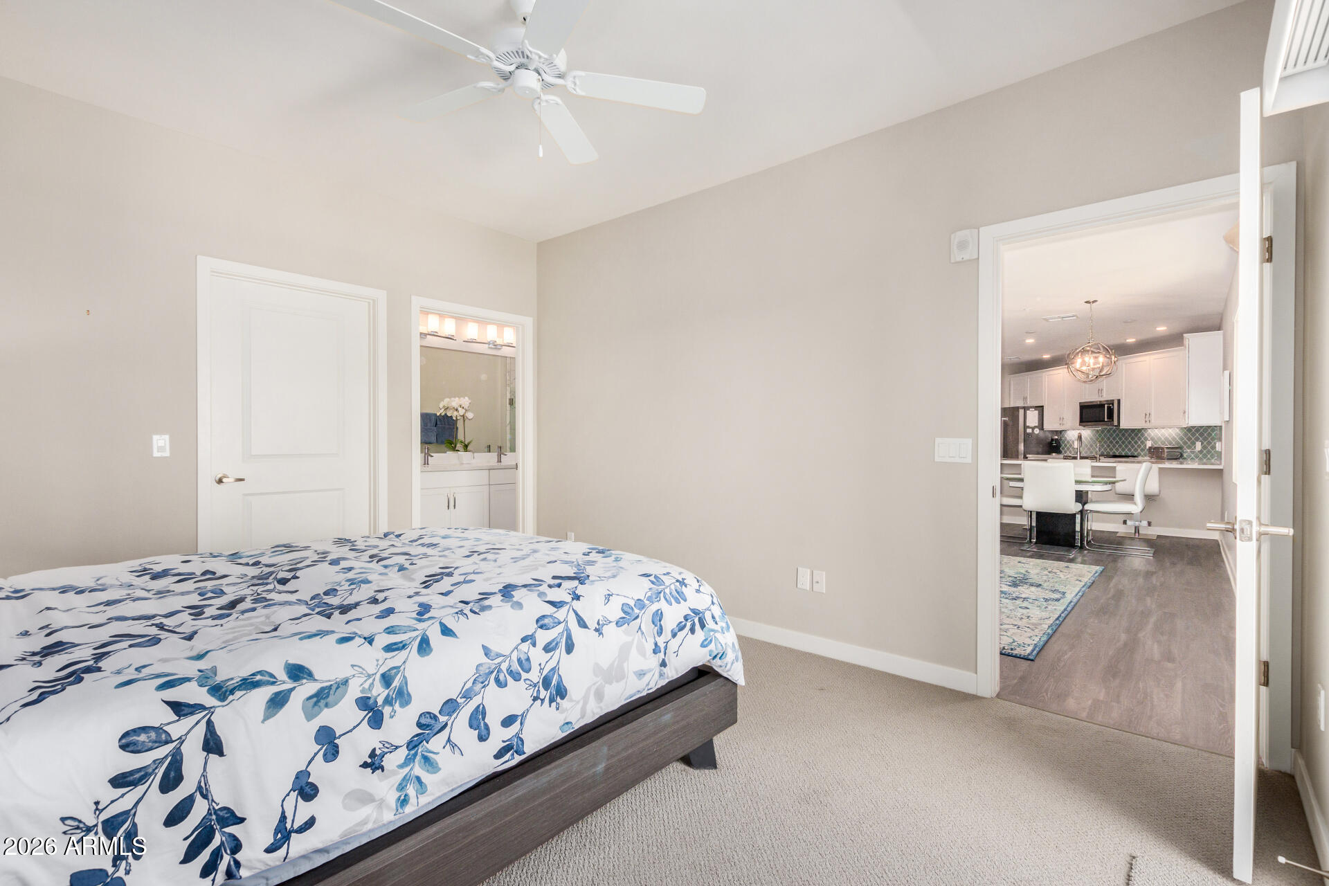 2511 West Queen Creek Road, Unit 258 Chandler, AZ 85248 - Photo 10 of 28 a bedroom with a bed and a view of bathroom