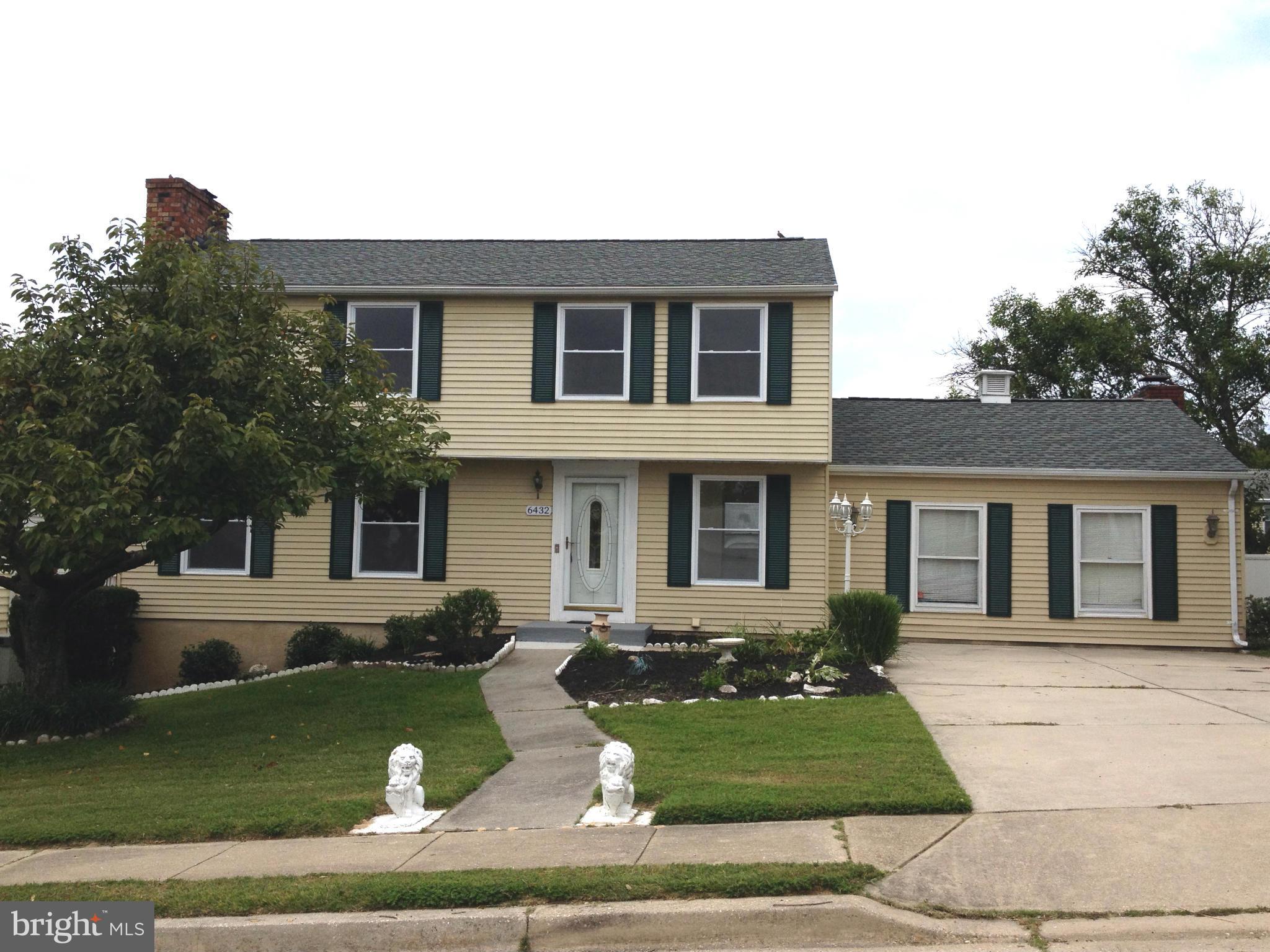 6432 St Phillips Road Linthicum, MD 21090 - Photo 1 of 27 a front view of a house with garden