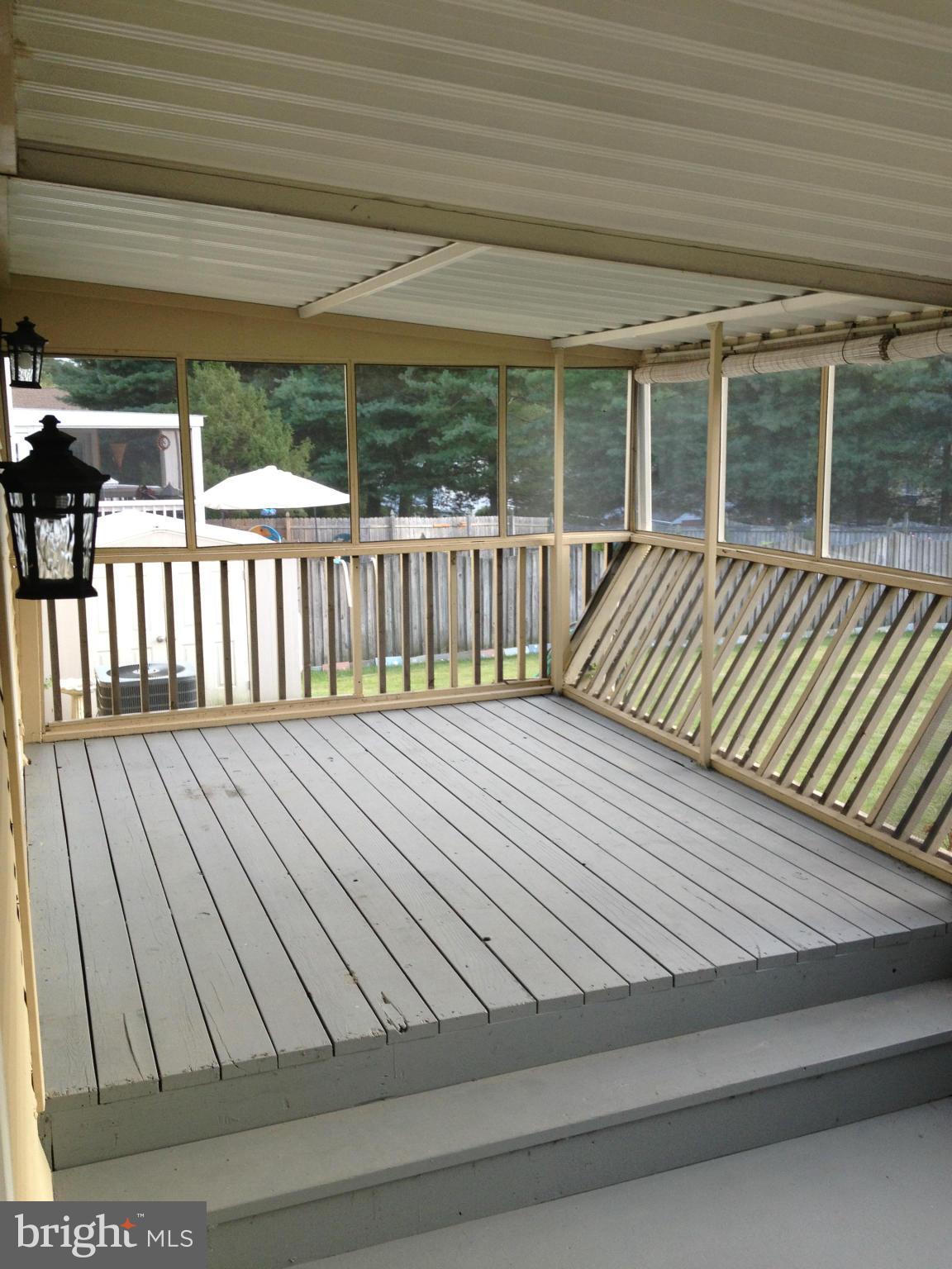 6432 St Phillips Road Linthicum, MD 21090 - Photo 14 of 27 a view of balcony with wooden floor