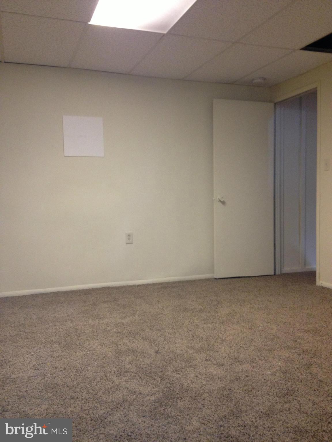 6432 St Phillips Road Linthicum, MD 21090 - Photo 22 of 27 a view of an empty room and window
