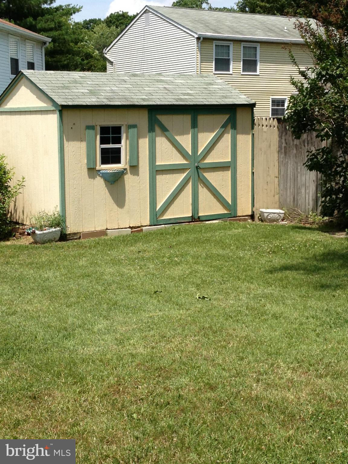 6432 St Phillips Road Linthicum, MD 21090 - Photo 25 of 27 a house with a yard