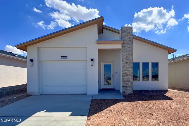 a house view with a outdoor space