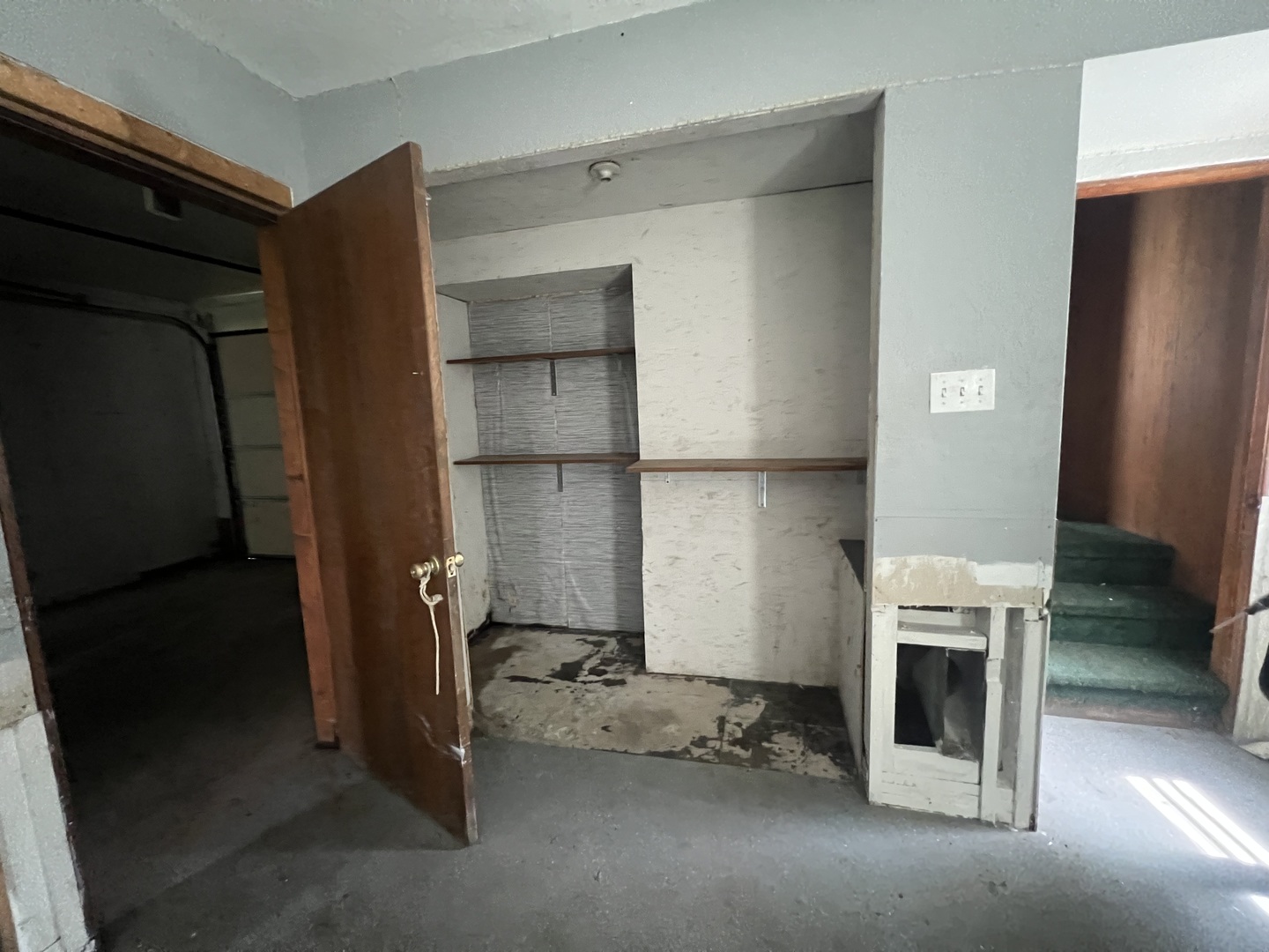 529 North 2nd Street Watseka, IL 60970 - Photo 7 of 16 a room with a fireplace and cabinets