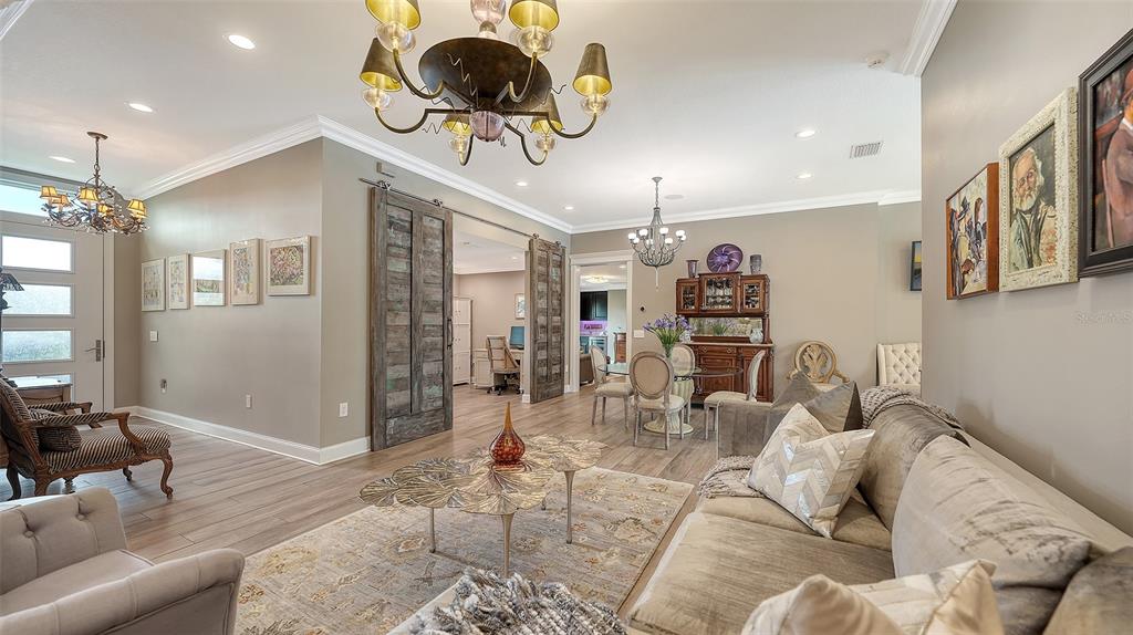 536 Ketch Lane Longboat Key, FL 34228 - Photo 10 of 80 a living room with furniture and a large window