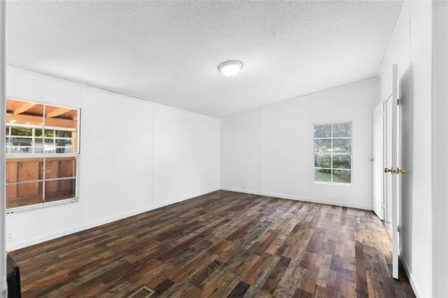 a kitchen with stainless steel appliances granite countertop a refrigerator sink and cabinets