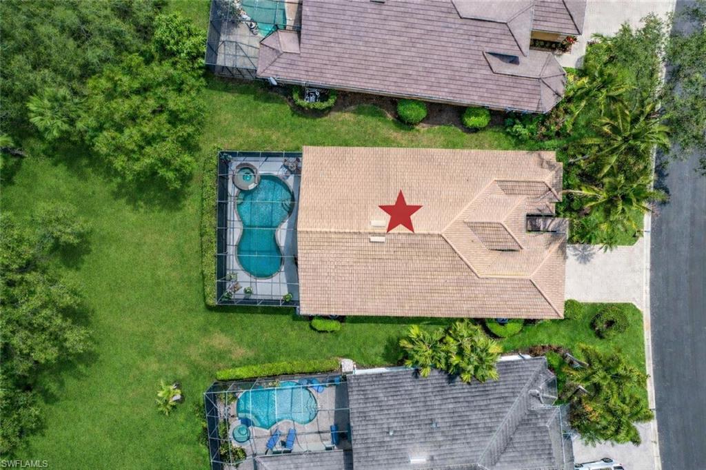 4832 Cerromar Drive Naples, FL 34112 - Photo 20 of 30 an aerial view of a house