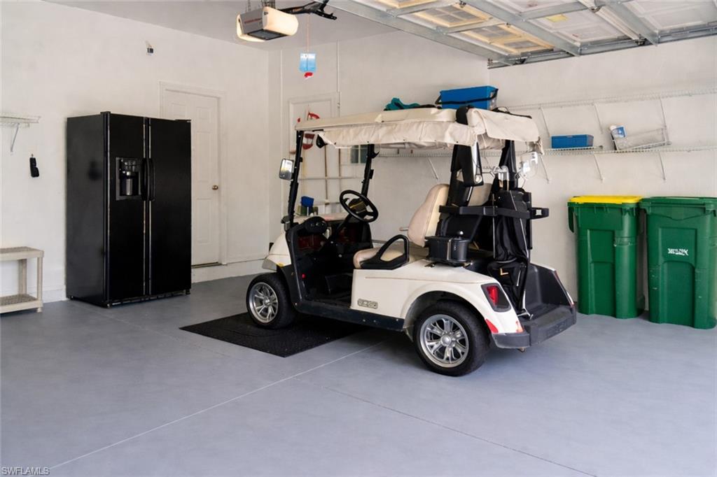 4832 Cerromar Drive Naples, FL 34112 - Photo 21 of 30 a view of car garage