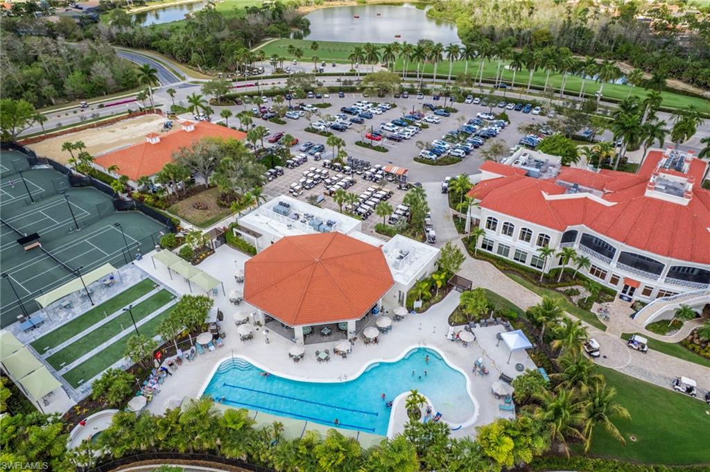 4832 Cerromar Drive Naples, FL 34112 - Photo 28 of 30 an aerial view of a pool yard swimming pool and outdoor seating
