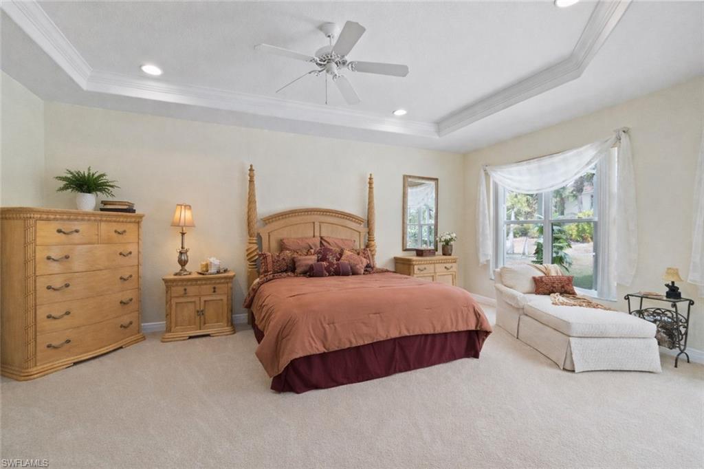 4832 Cerromar Drive Naples, FL 34112 - Photo 10 of 30 a bedroom with bed and window