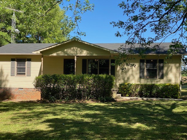 546 Rutledge Ford Road Decherd, TN 37324 - Photo 2 of 26 a front view of a house with a garden