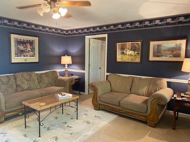 546 Rutledge Ford Road Decherd, TN 37324 - Photo 15 of 26 a living room with furniture and a mirror