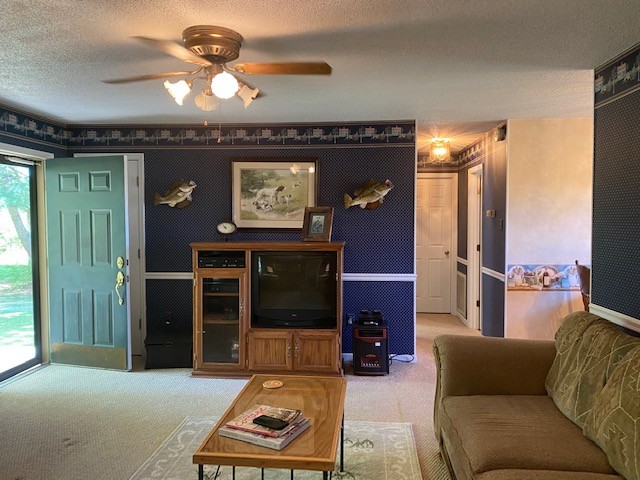 546 Rutledge Ford Road Decherd, TN 37324 - Photo 16 of 26 a living room with furniture and a fireplace