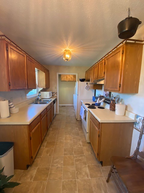 546 Rutledge Ford Road Decherd, TN 37324 - Photo 18 of 26 a kitchen with a sink and cabinets