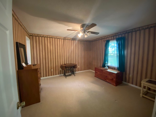 546 Rutledge Ford Road Decherd, TN 37324 - Photo 22 of 26 an empty room with furniture and a window