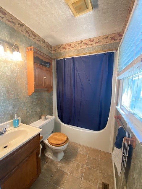 546 Rutledge Ford Road Decherd, TN 37324 - Photo 23 of 26 a bathroom with a sink toilet and shower