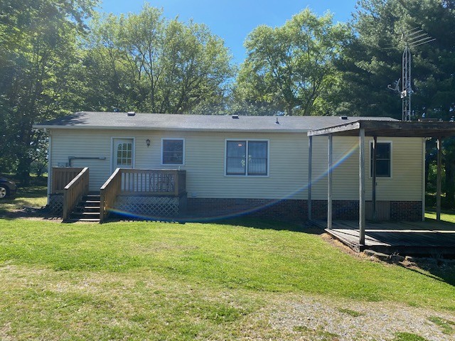 546 Rutledge Ford Road Decherd, TN 37324 - Photo 9 of 26 a view of a house with a yard and sitting area