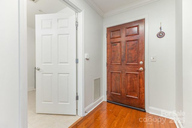 an empty room with wooden door
