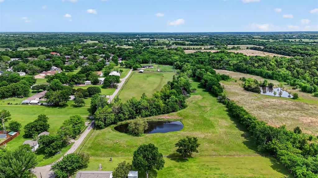 Tbd Pecan Street Ector, TX 75439 - Photo 6 of 18 a view of a house with a yard and lake view