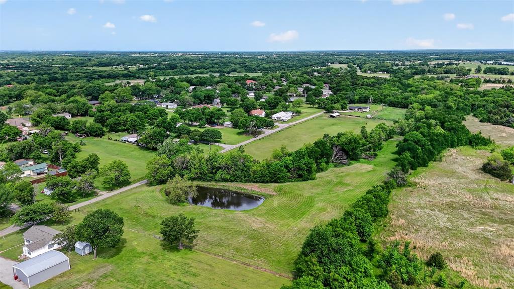 Tbd Pecan Street Ector, TX 75439 - Photo 7 of 18 an aerial view of a houses with a yard and lake view