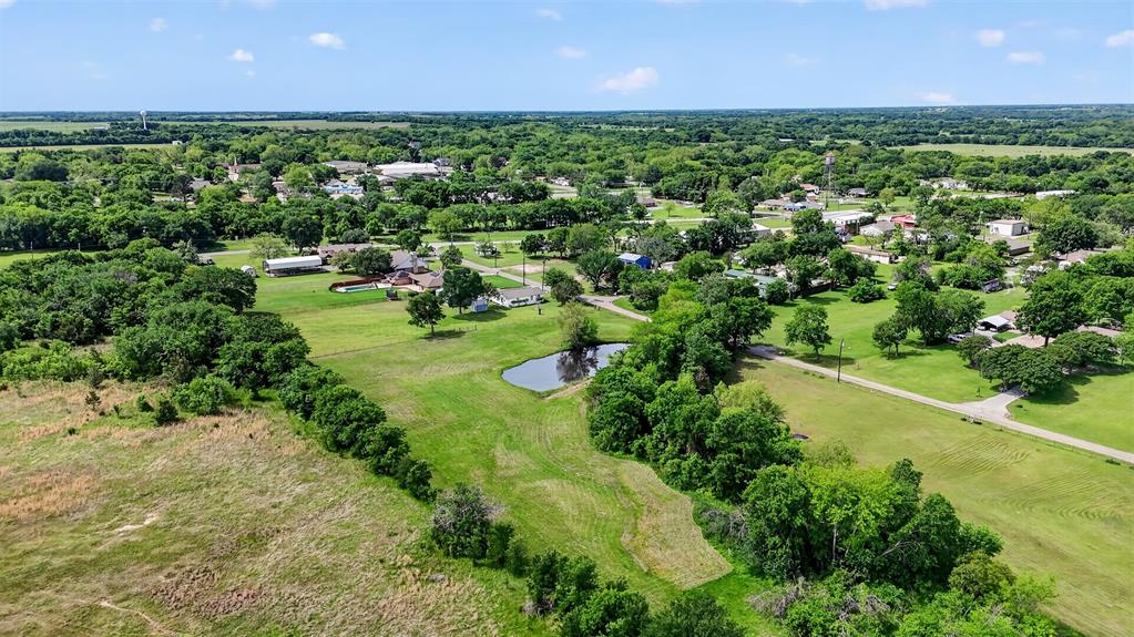 Tbd Pecan Street Ector, TX 75439 - Photo 10 of 18 an aerial view of a houses with a yard and trees