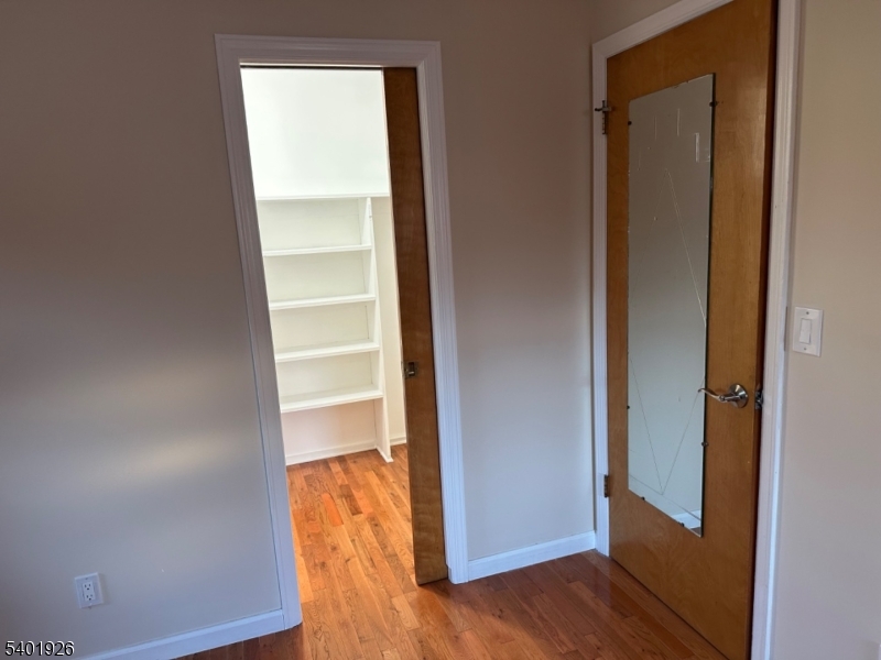 244 Olivia Street Ridgewood, NJ 07450 - Photo 22 of 43 a view of walk in closet with empty room