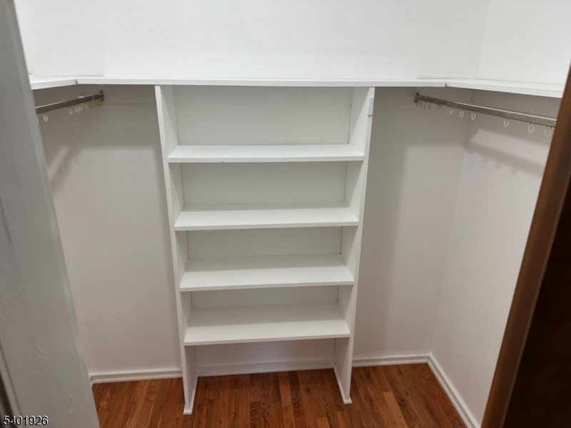 244 Olivia Street Ridgewood, NJ 07450 - Photo 23 of 43 a view of walk in closet with empty racks