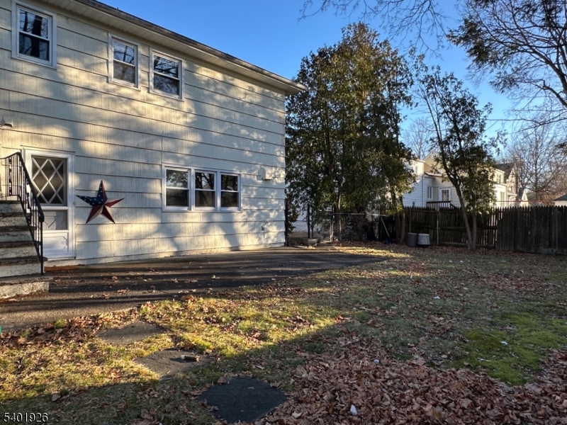 244 Olivia Street Ridgewood, NJ 07450 - Photo 41 of 43 a view of a house with a yard