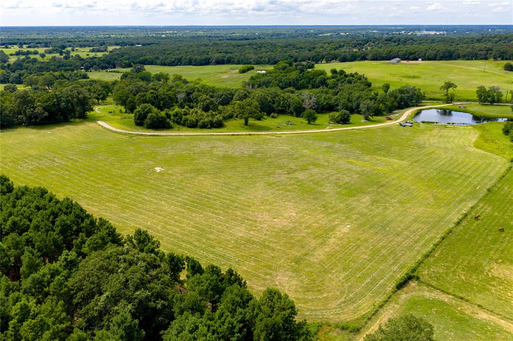Tbd Tbd Cr-1200 Athens, TX 75751 - Photo 5 of 10 a view of a lake with a big yard