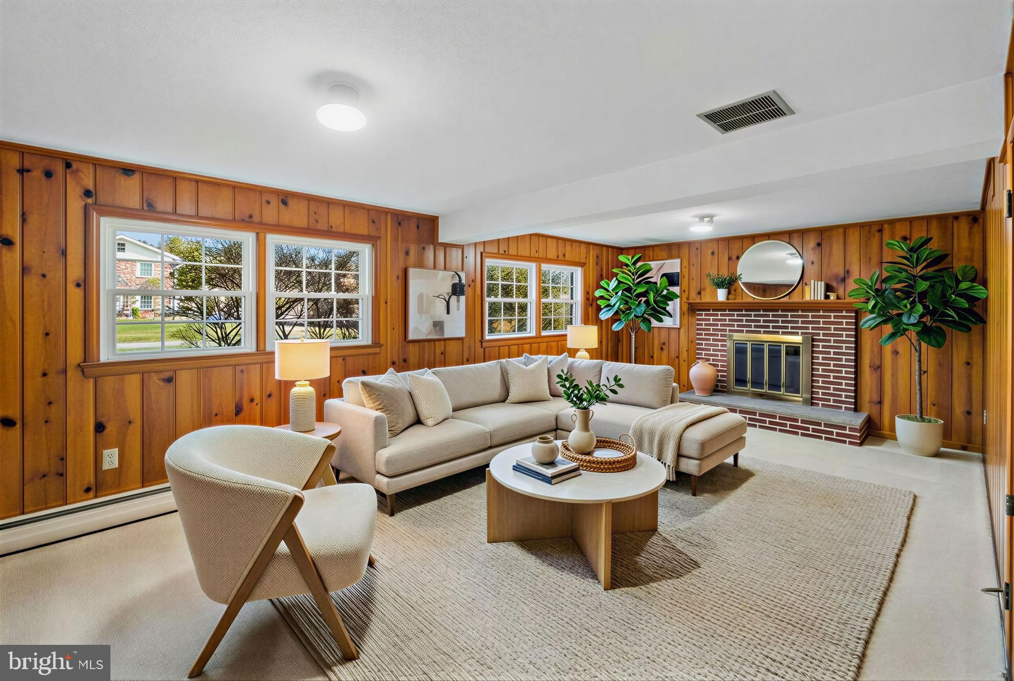 807 Winhall Way Silver Spring, MD 20904 - Photo 11 of 82 a living room with furniture potted plant and a large window
