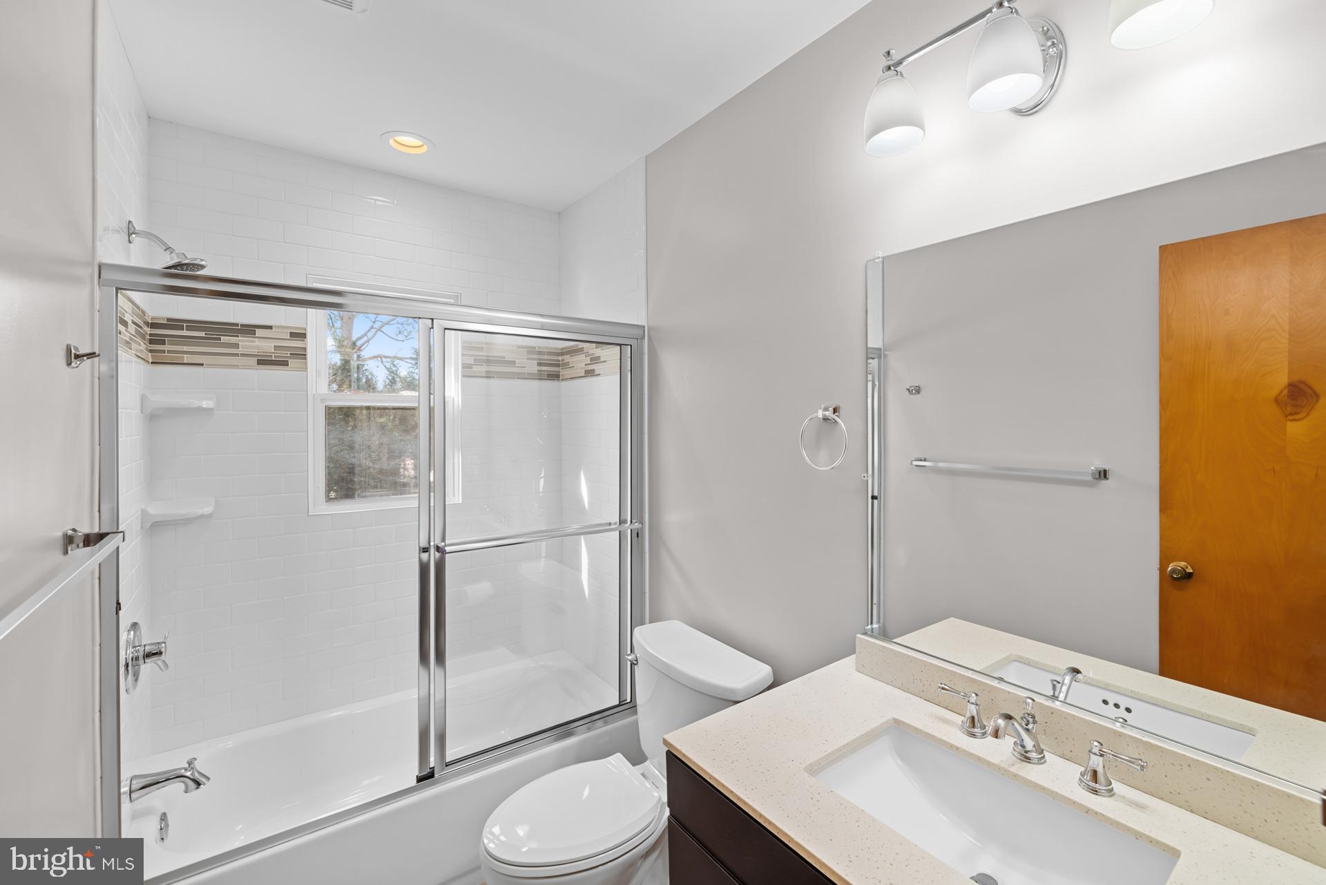 807 Winhall Way Silver Spring, MD 20904 - Photo 36 of 82 a bathroom with a sink toilet and shower