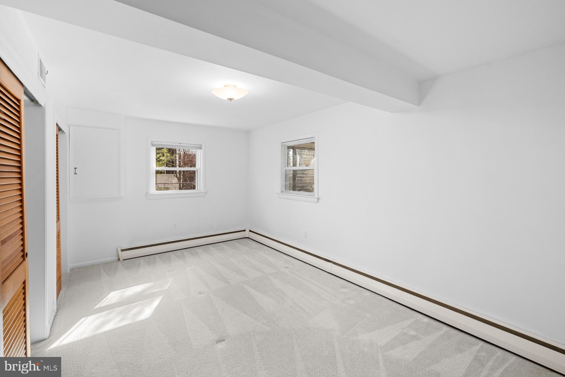 807 Winhall Way Silver Spring, MD 20904 - Photo 49 of 82 an empty room with windows