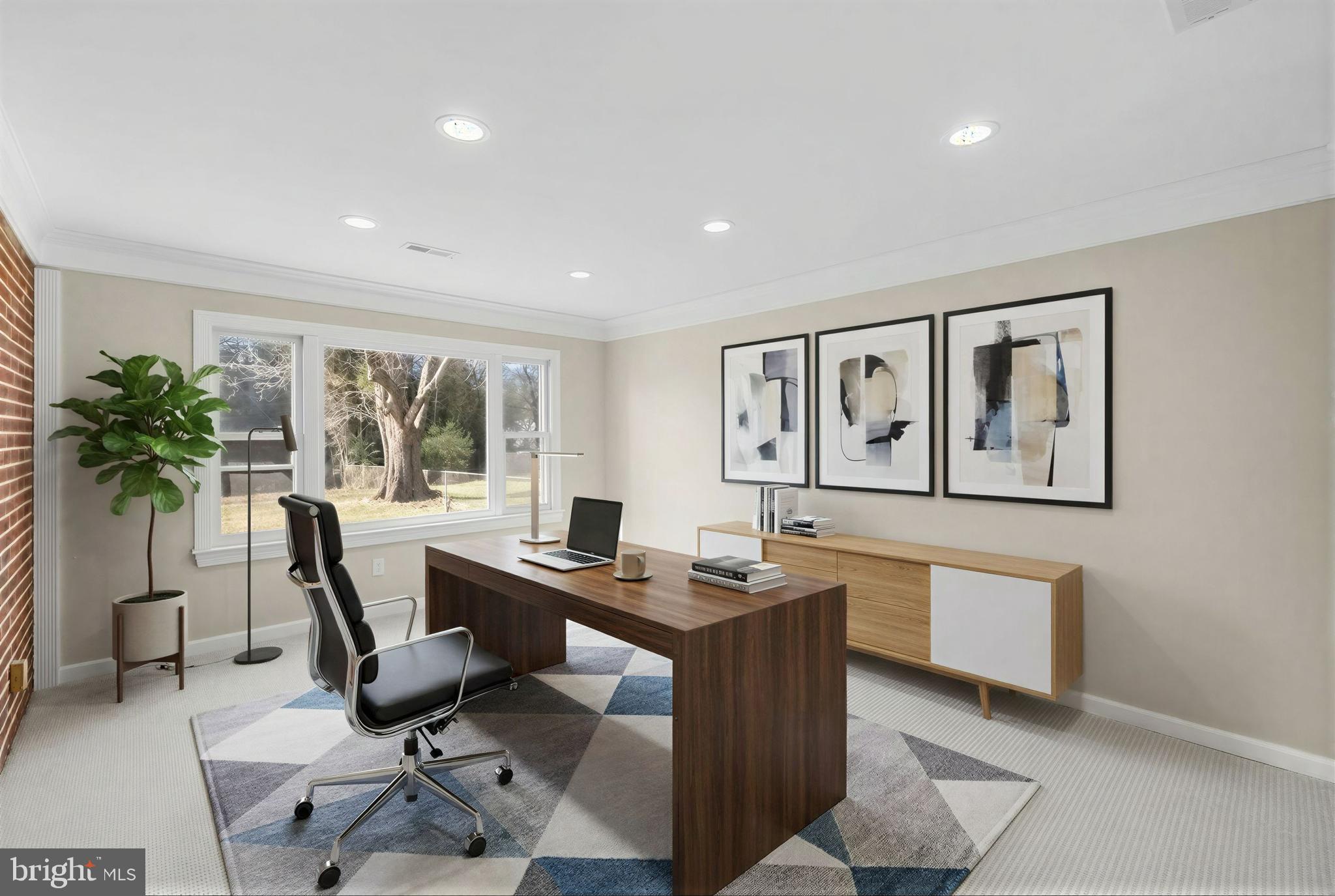807 Winhall Way Silver Spring, MD 20904 - Photo 10 of 82 a view of a workspace with furniture and a potted plant