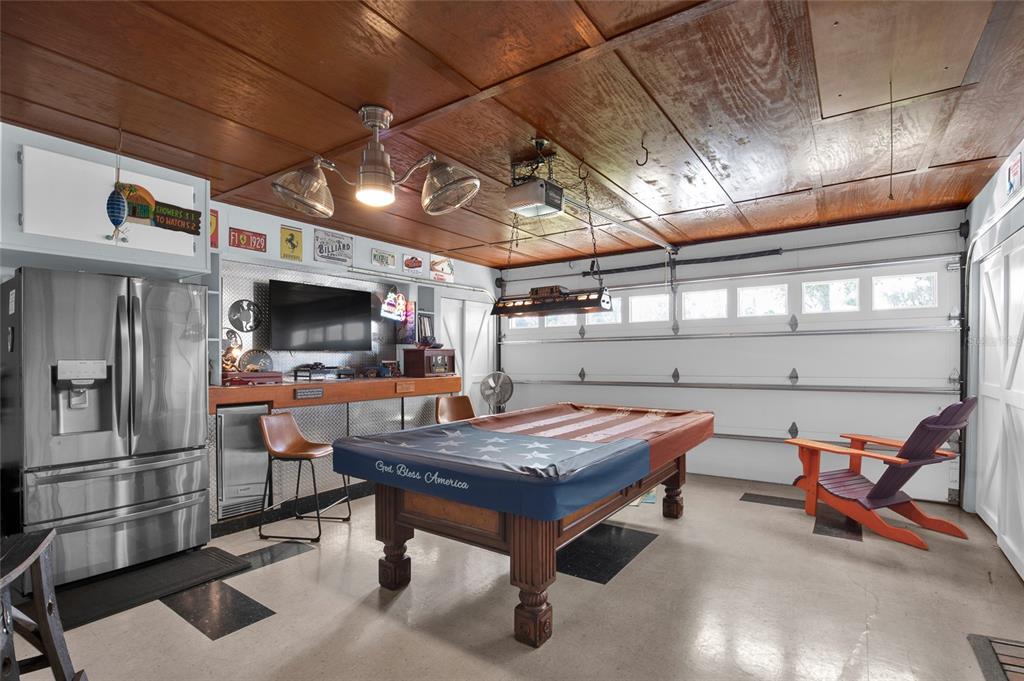 4121 South Roosevelt Point Homosassa, FL 34448 - Photo 25 of 47 a room with furniture and flat screen tv