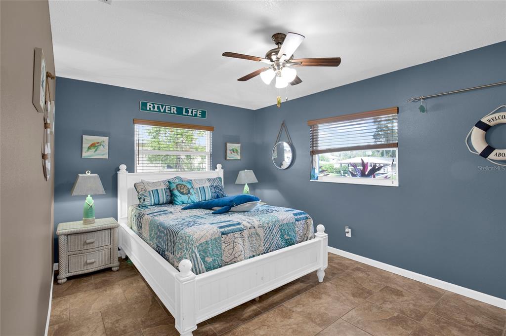 4121 South Roosevelt Point Homosassa, FL 34448 - Photo 28 of 47 a bedroom with a bed and a window