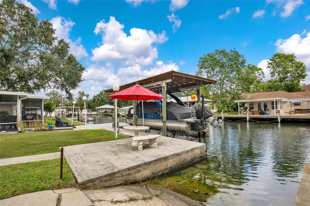 4121 South Roosevelt Point Homosassa, FL 34448 - Photo 37 of 47 a view of a house with swimming pool and porch