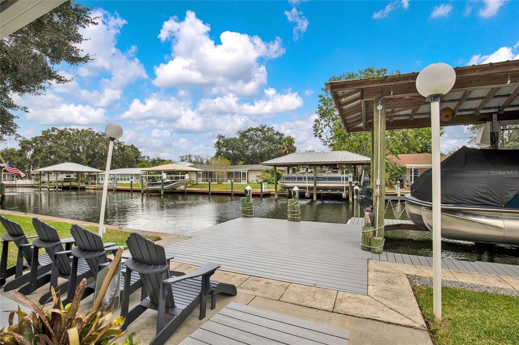 4121 South Roosevelt Point Homosassa, FL 34448 - Photo 4 of 47 a roof deck with table and chairs