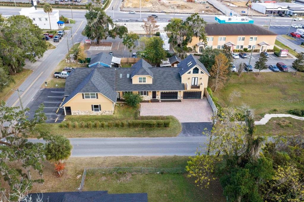 434 Southwest 14th Street, Unit A Ocala, FL 34471 - Photo 27 of 97 an aerial view of a house with a yard basket ball court and outdoor seating