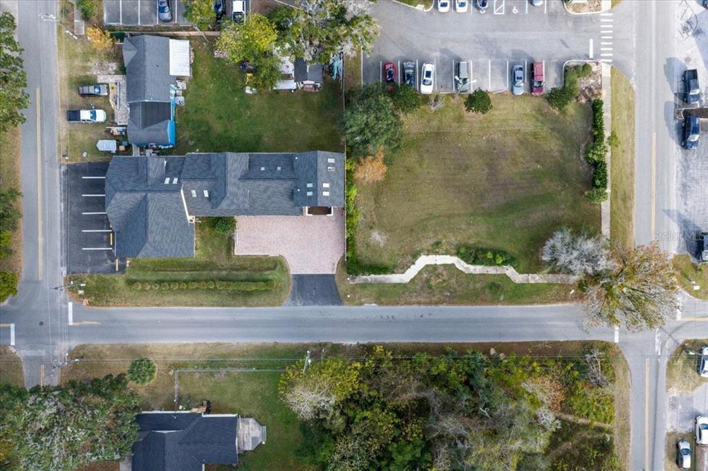 434 Southwest 14th Street, Unit A Ocala, FL 34471 - Photo 30 of 97 an aerial view of a house with a yard