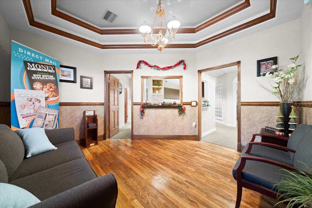 434 Southwest 14th Street, Unit A Ocala, FL 34471 - Photo 39 of 97 a living room with furniture and wooden floor