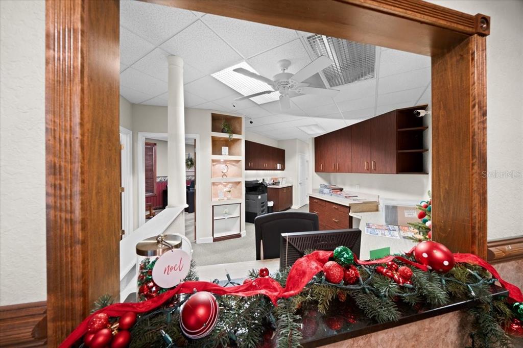 434 Southwest 14th Street, Unit A Ocala, FL 34471 - Photo 40 of 97 a bedroom with furniture and a flat screen tv