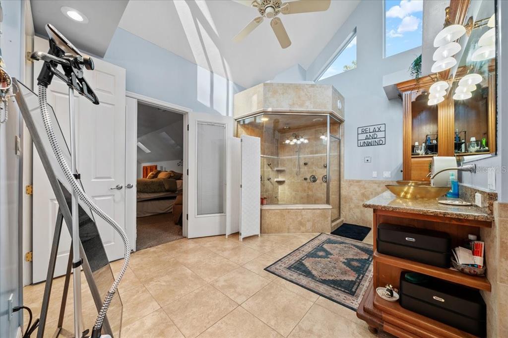 434 Southwest 14th Street, Unit A Ocala, FL 34471 - Photo 94 of 97 a living room with furniture and a flat screen tv