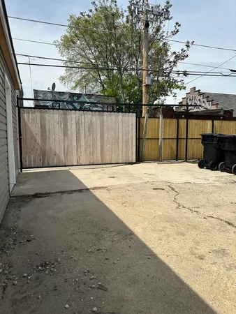 a view of a backyard of the house