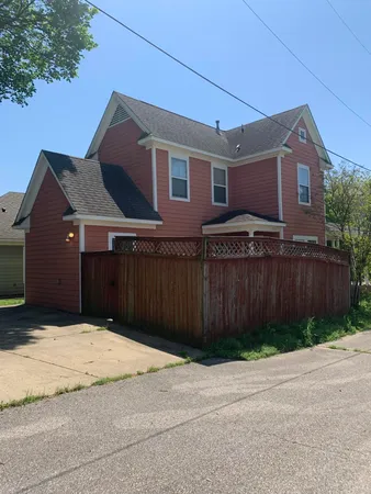 a front view of house with a yard