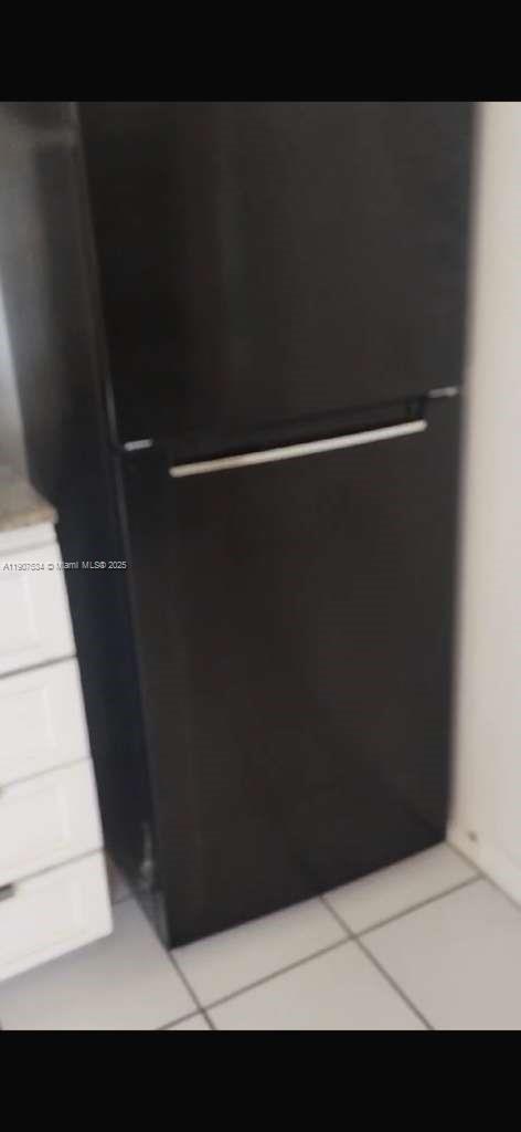 6980 Northwest 186th Street, Unit 3127A Hialeah, FL 33015 - Photo 4 of 4 a view of cupboard