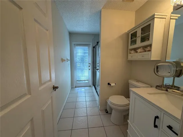 a bathroom with a toilet and a sink