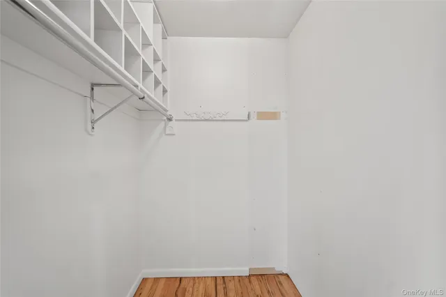 a view of small space with racks on the wall