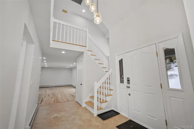 a view of an entryway with staircase