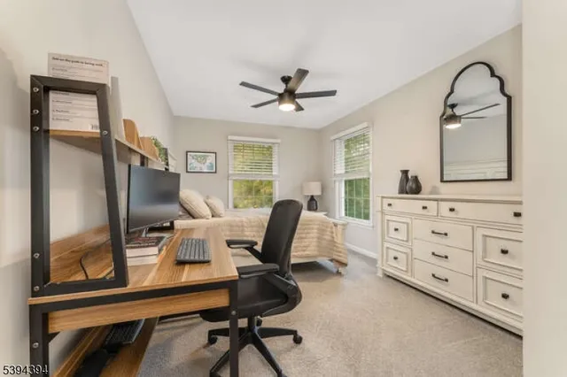 a work room with furniture and wooden floor