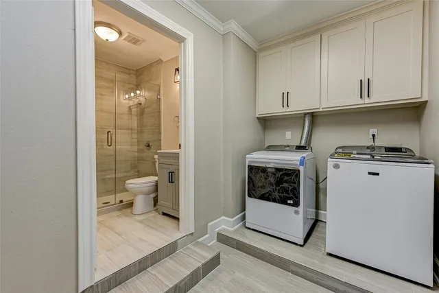 a view of a kitchen with toilet and sink