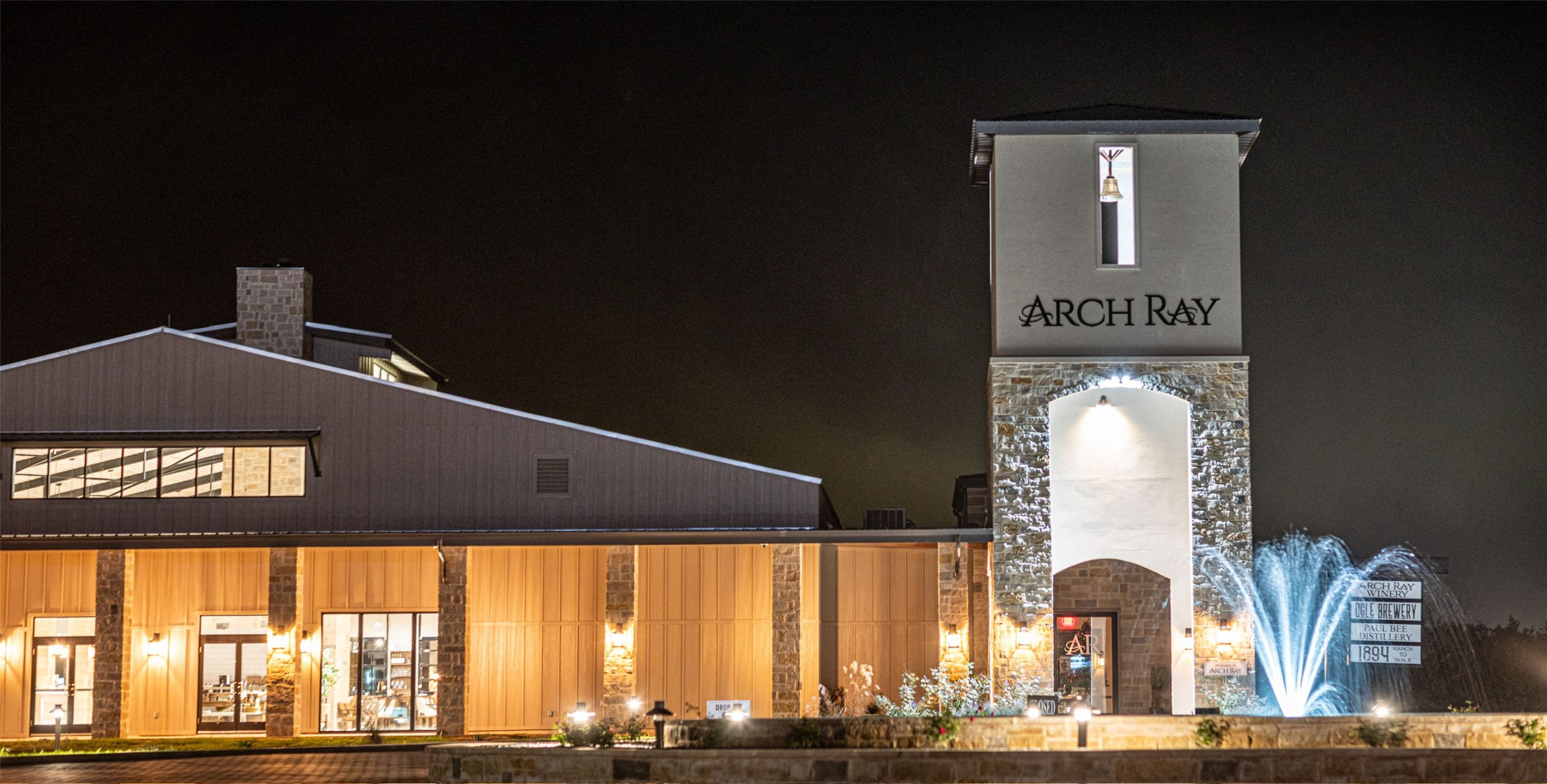 97 Arch Ray Loop Fredericksburg, TX 78624 - Photo 4 of 10 a front view of a house with a garden